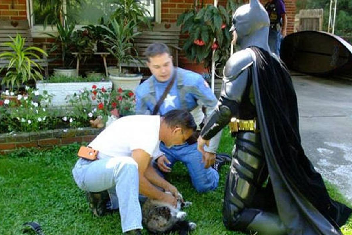 Superheroes Rescue Cat From Burning House