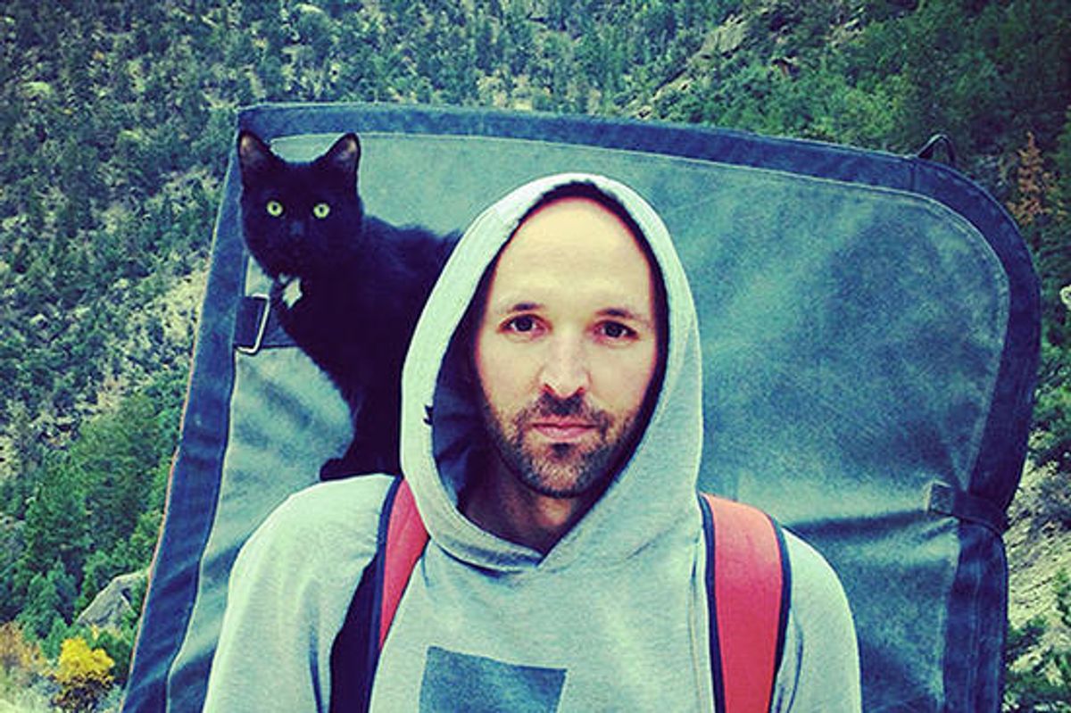 Adopted Cat Becomes Man's Best Climbing Partner
