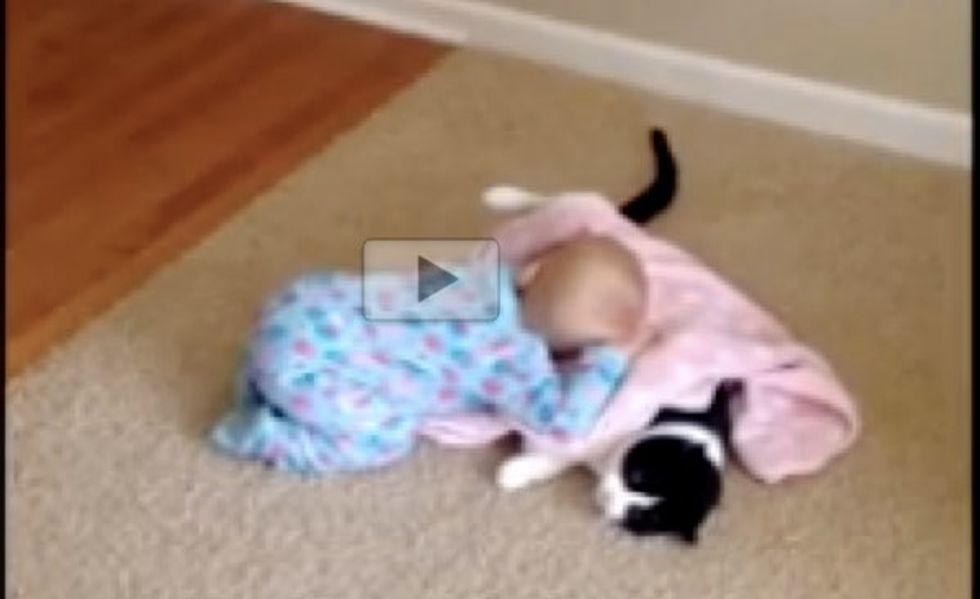 Kitty and His Little Human Getting Ready for Nap Time