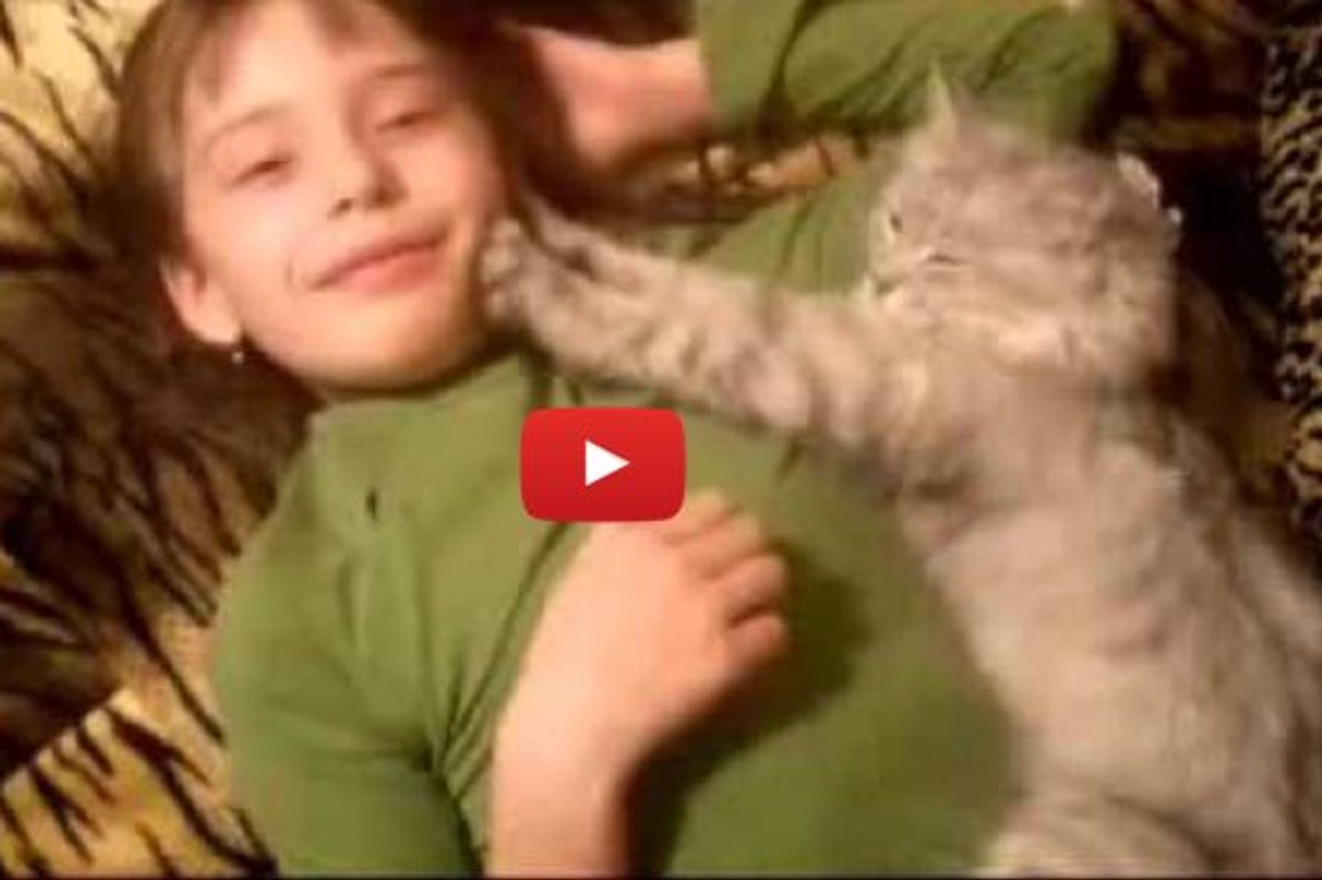 Kitty Keeps His Human's Smile Muscles Nice and Supple with His Kneady Paws!