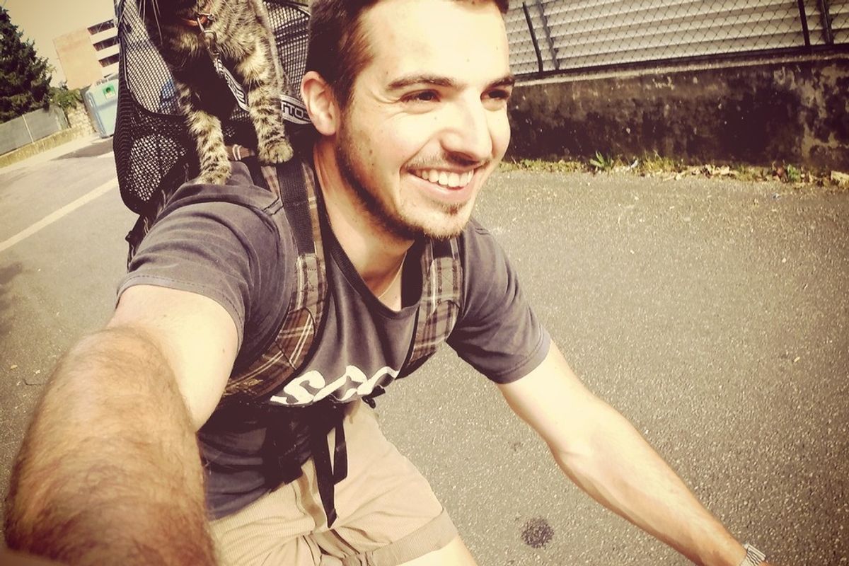 man adopted shelter cat goes on adventures