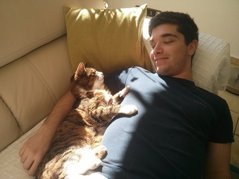 man and cat 21 years together