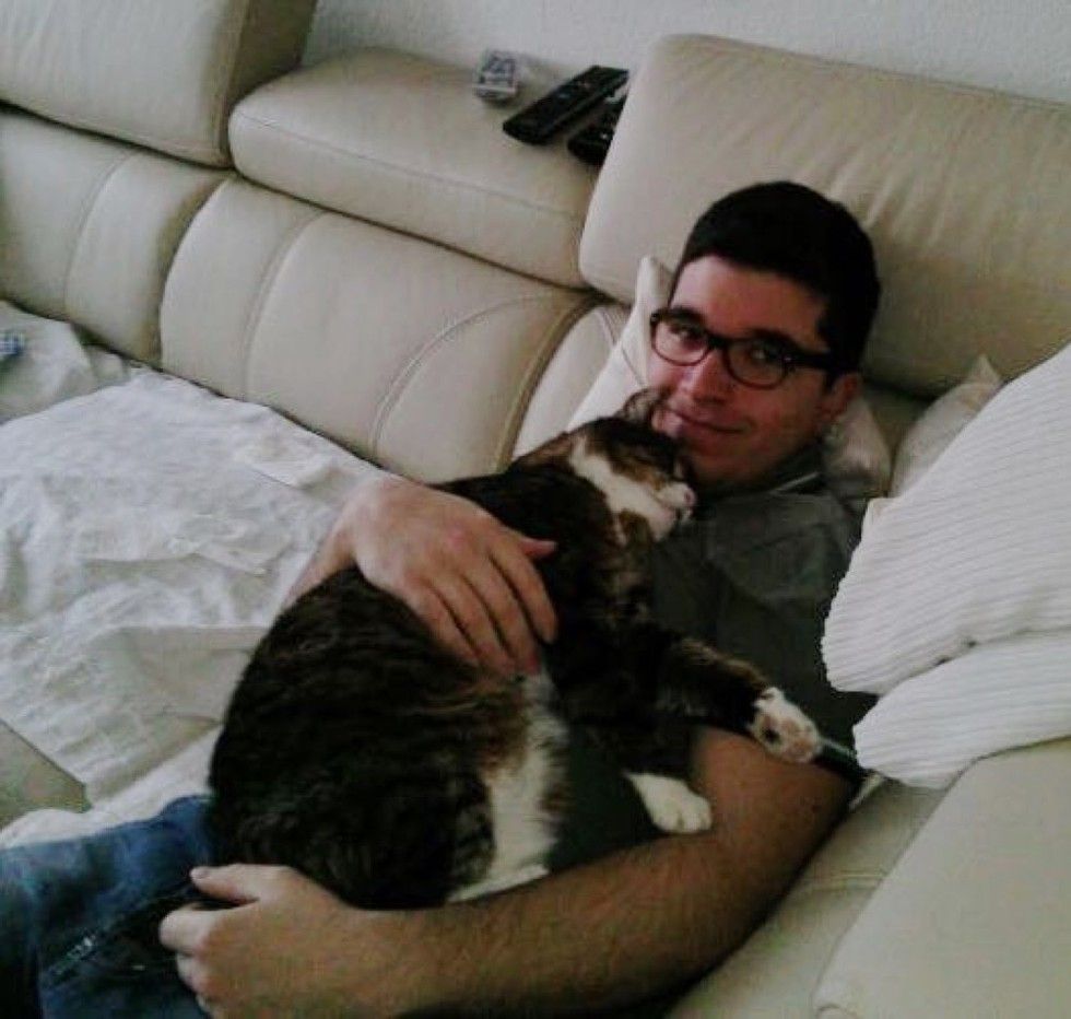 man and cat 21 years together